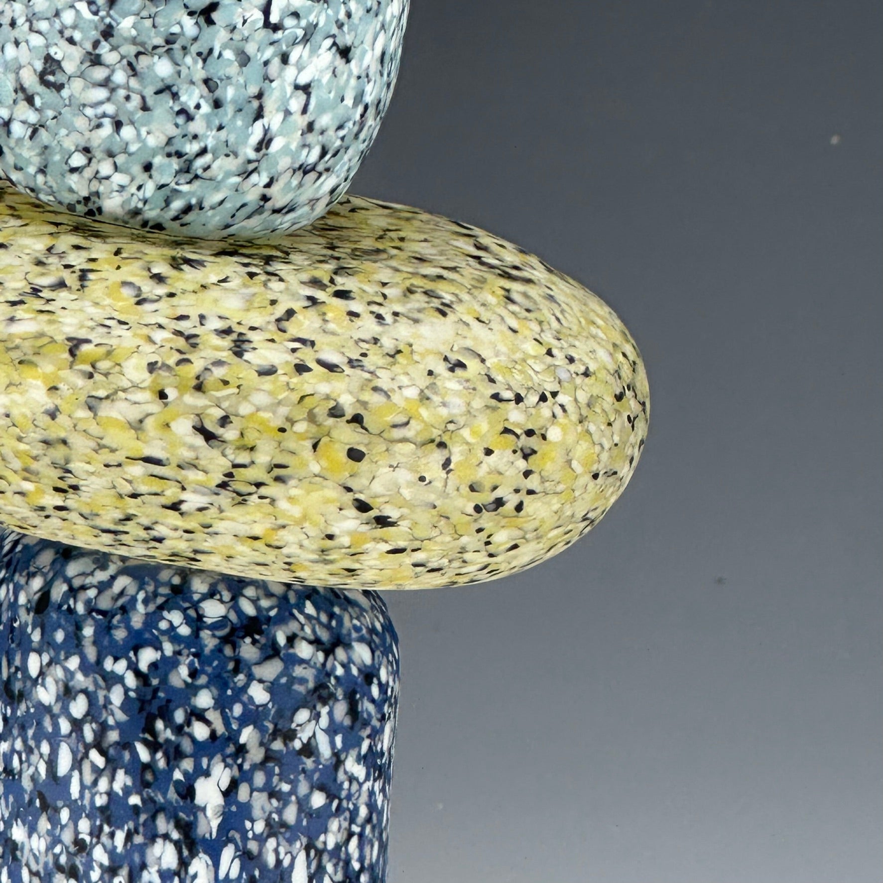 detail of 3 stone glass cairn