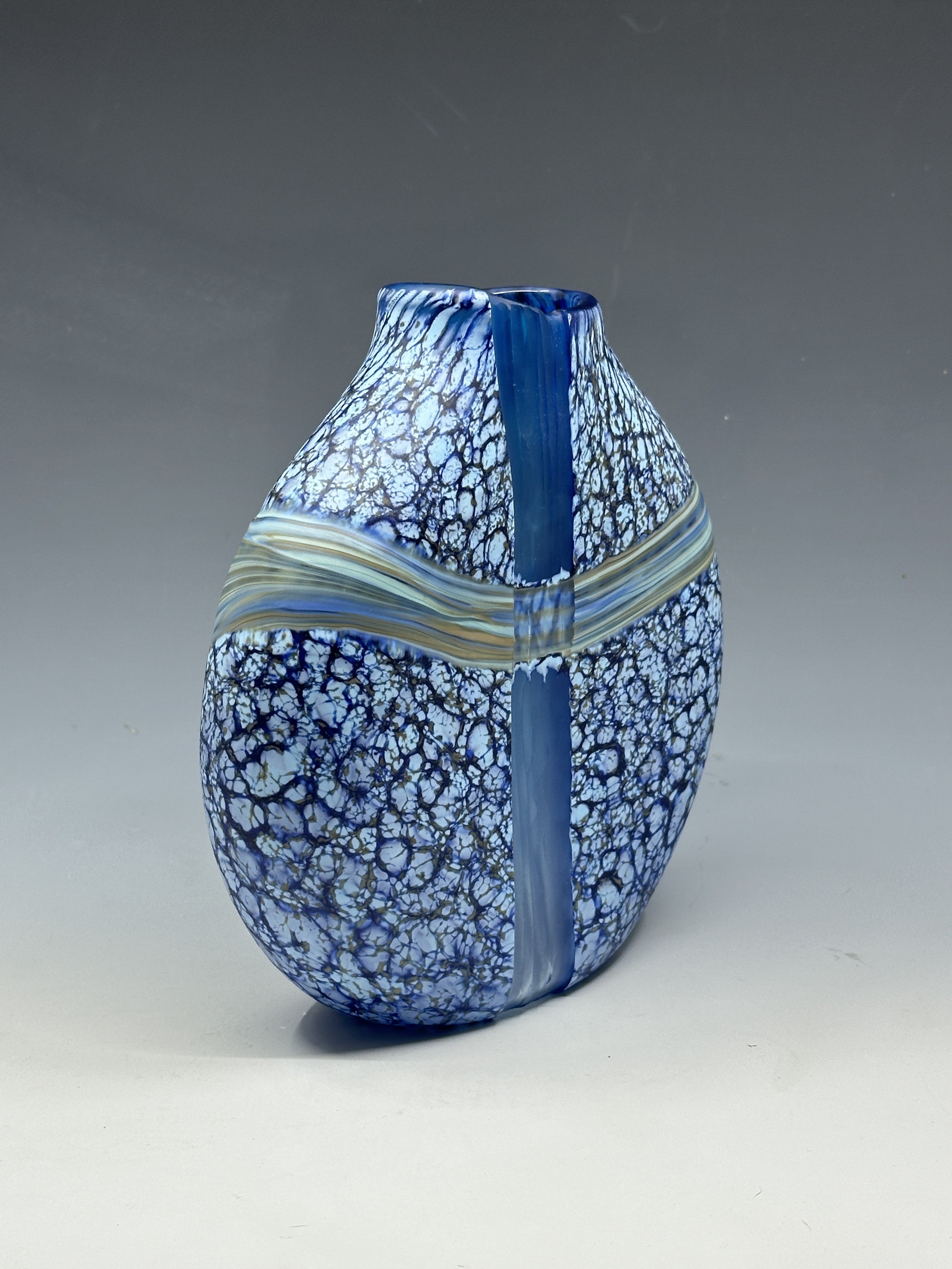 side view of blue convergence vase