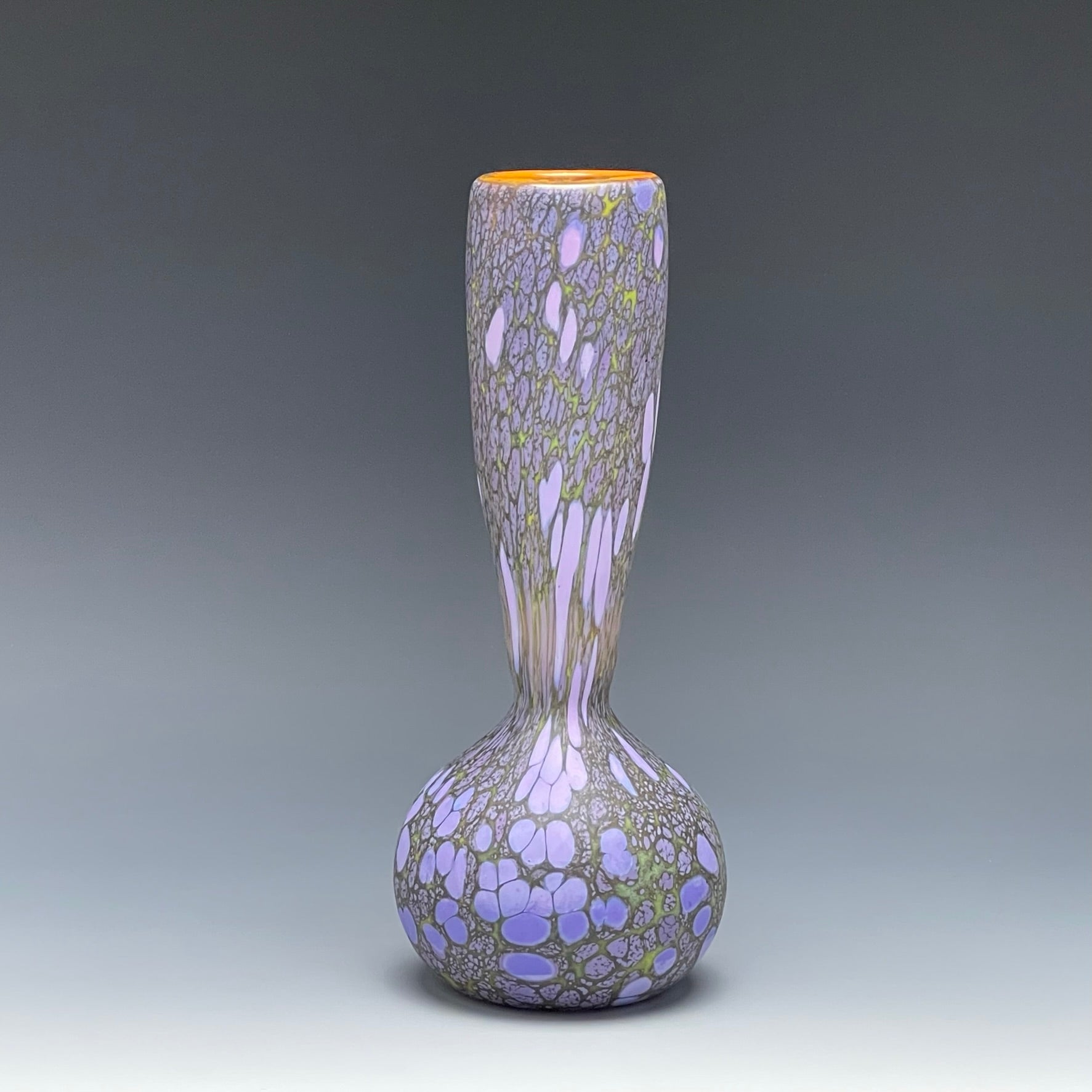 purple blown glass bottle