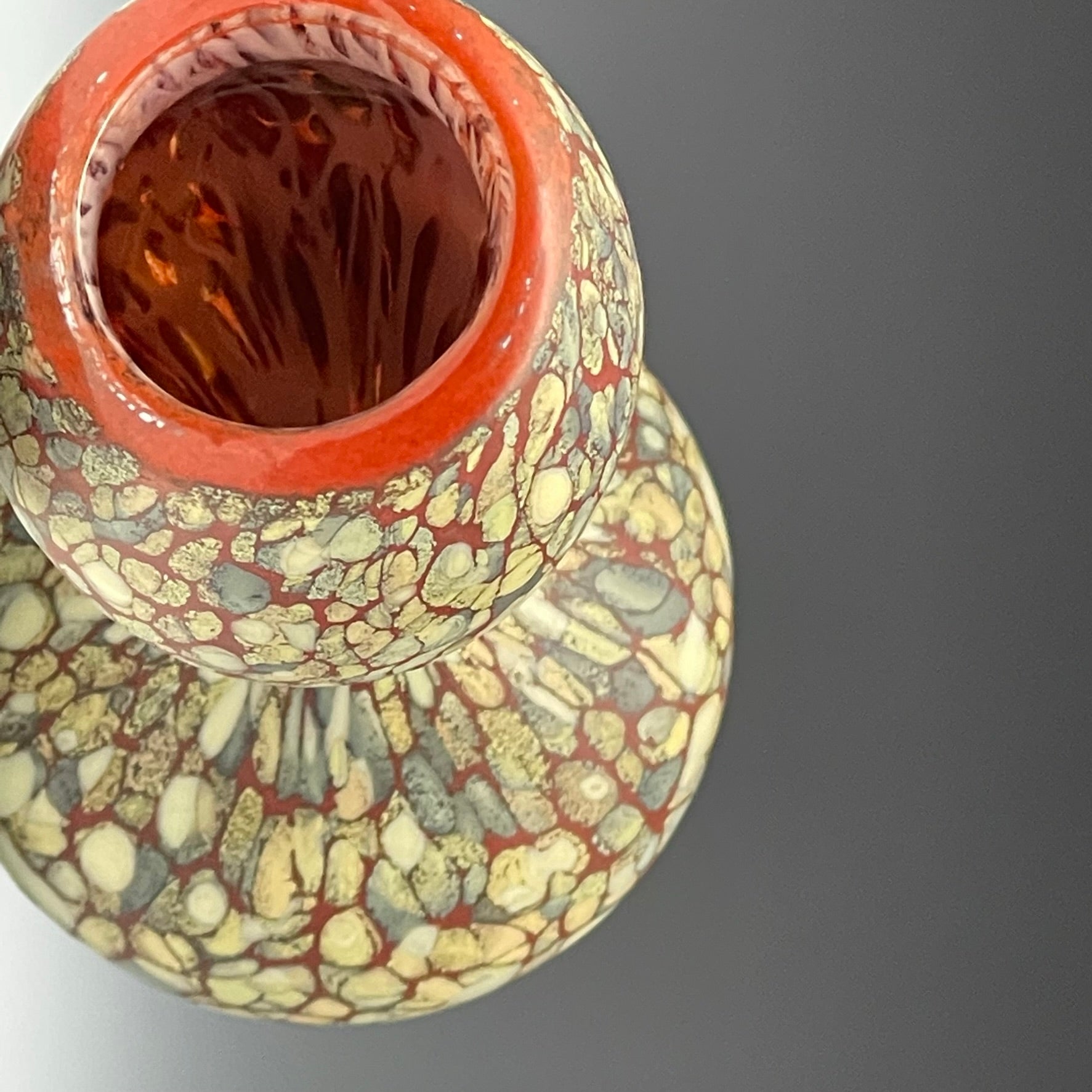 top view of sandy blown glass bottle