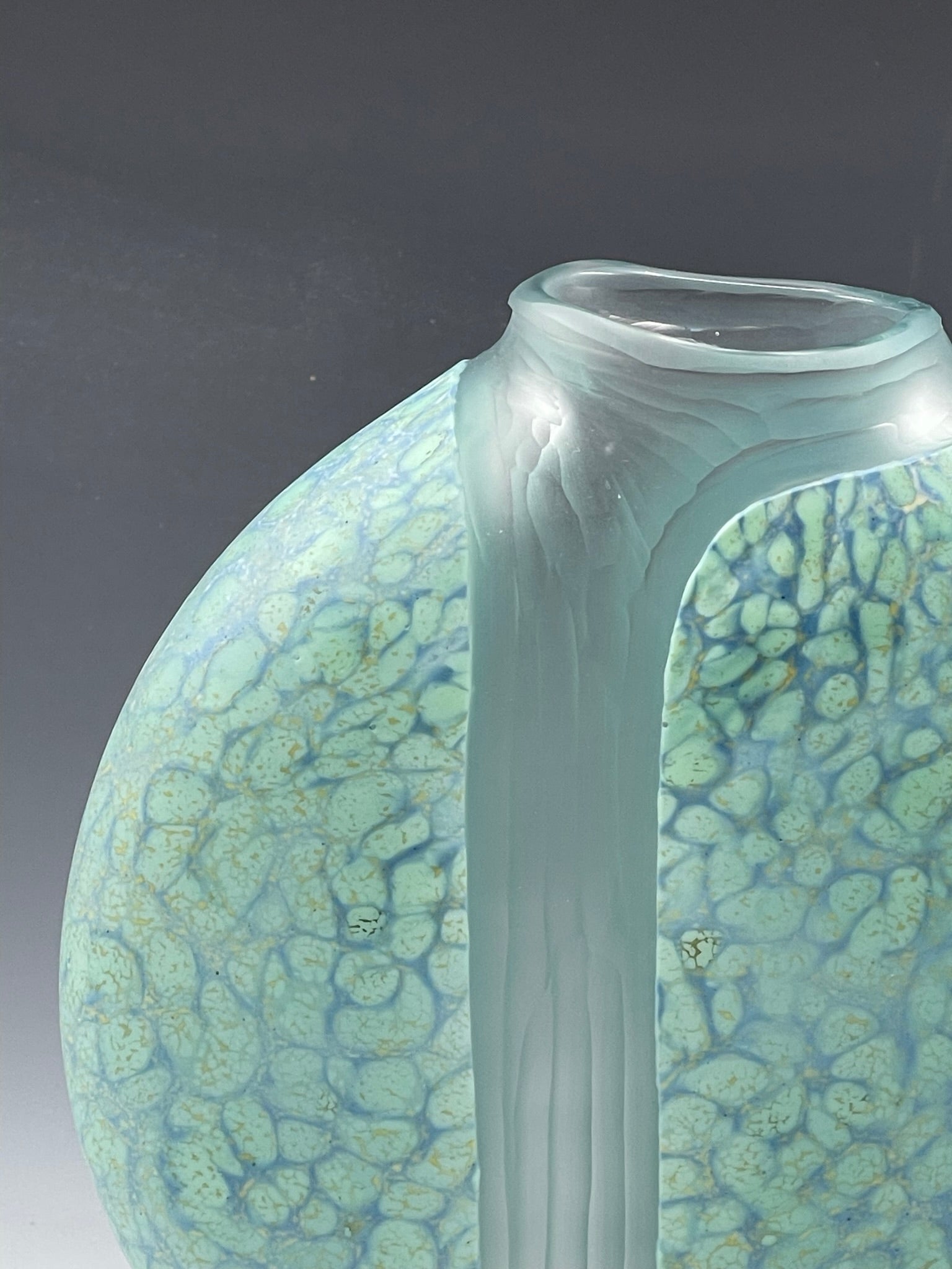 detail of celadon blown glass cascade vase