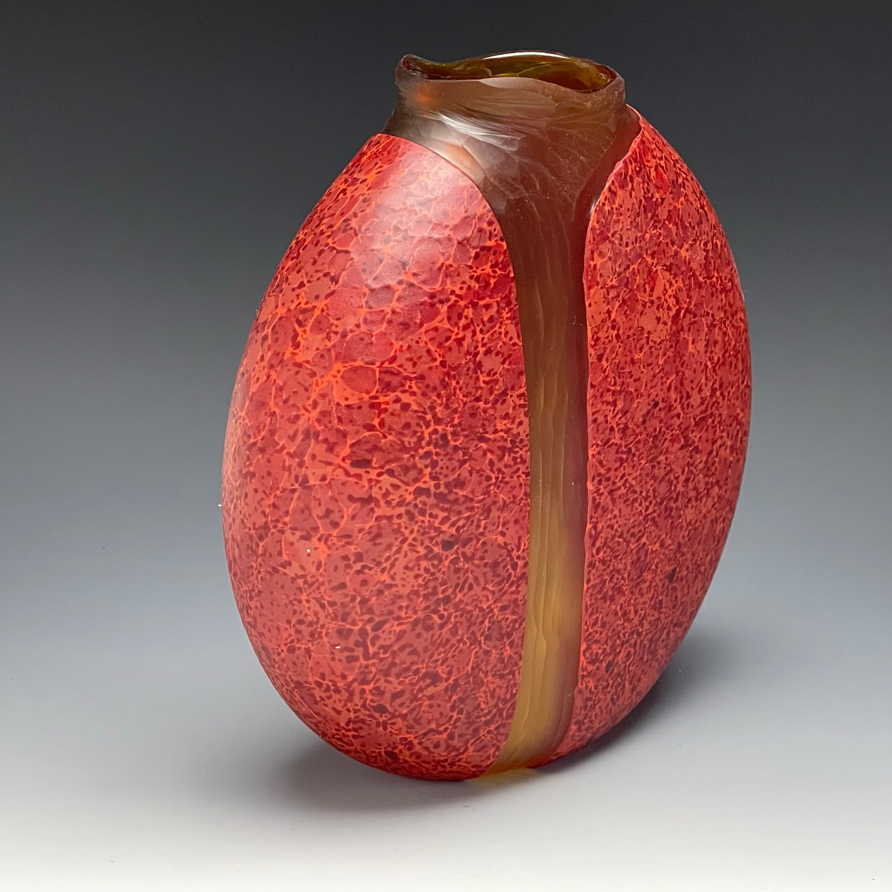 side view of red cascade vase