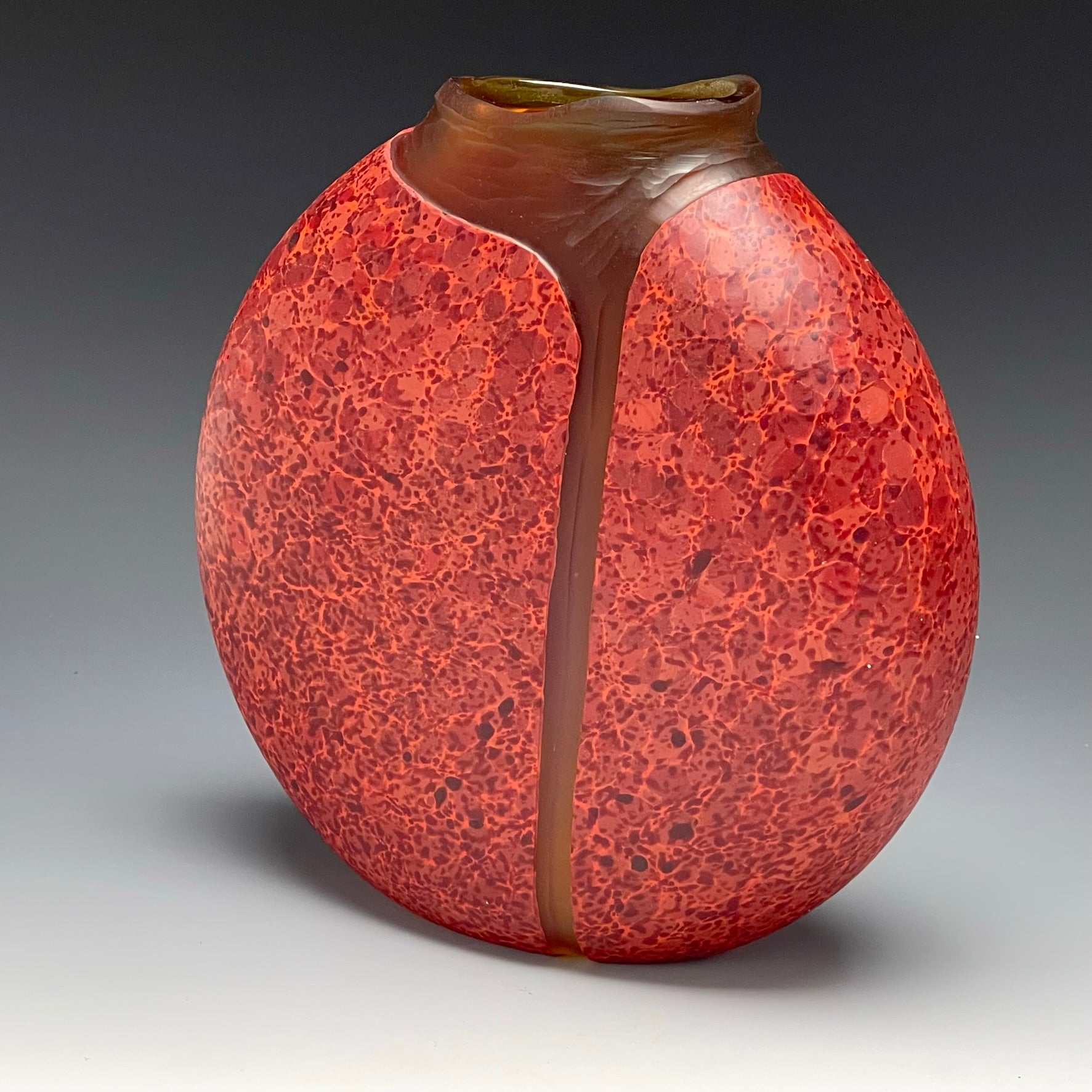 back view of red cascade vase