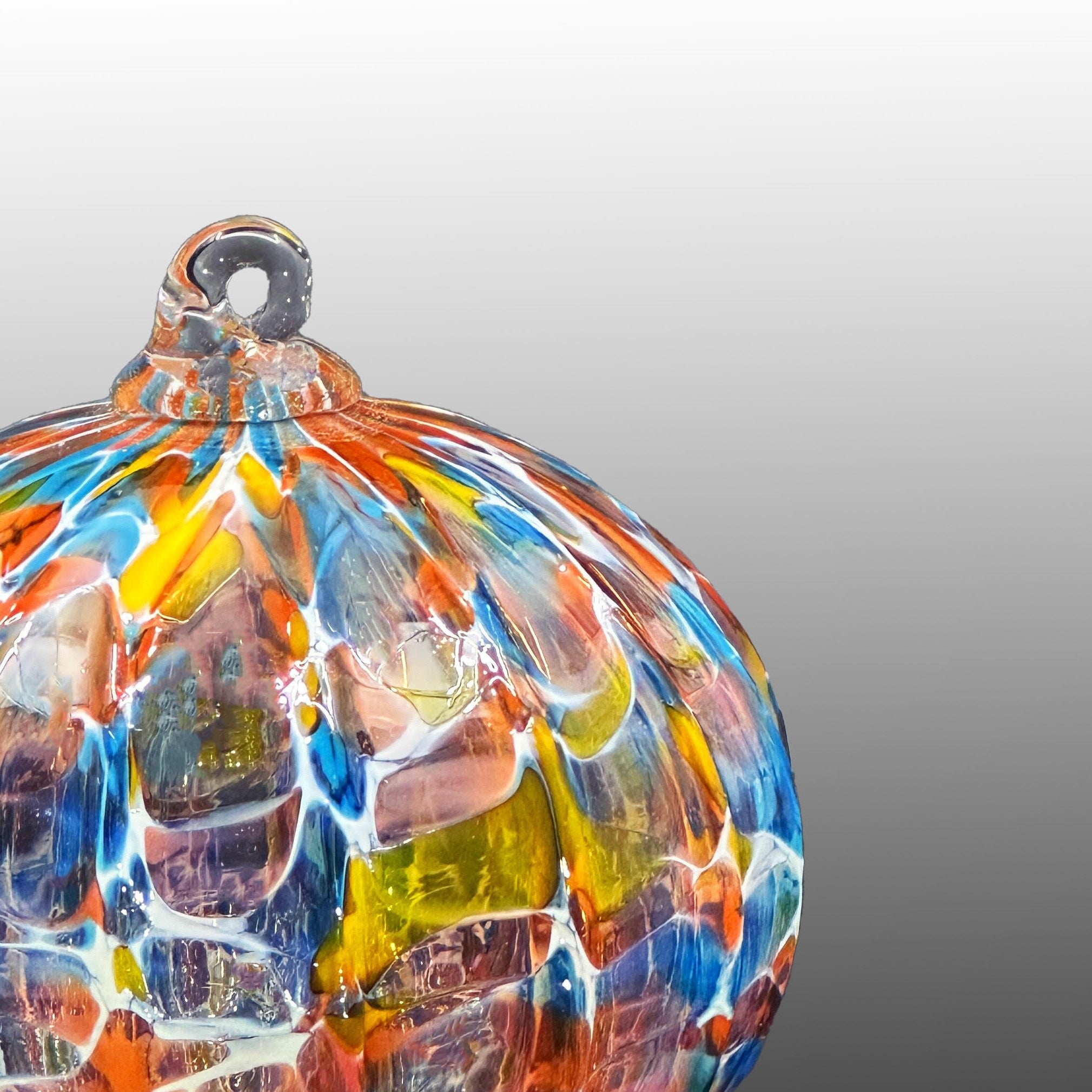 Blown glass ribbed ornament • Celebrate