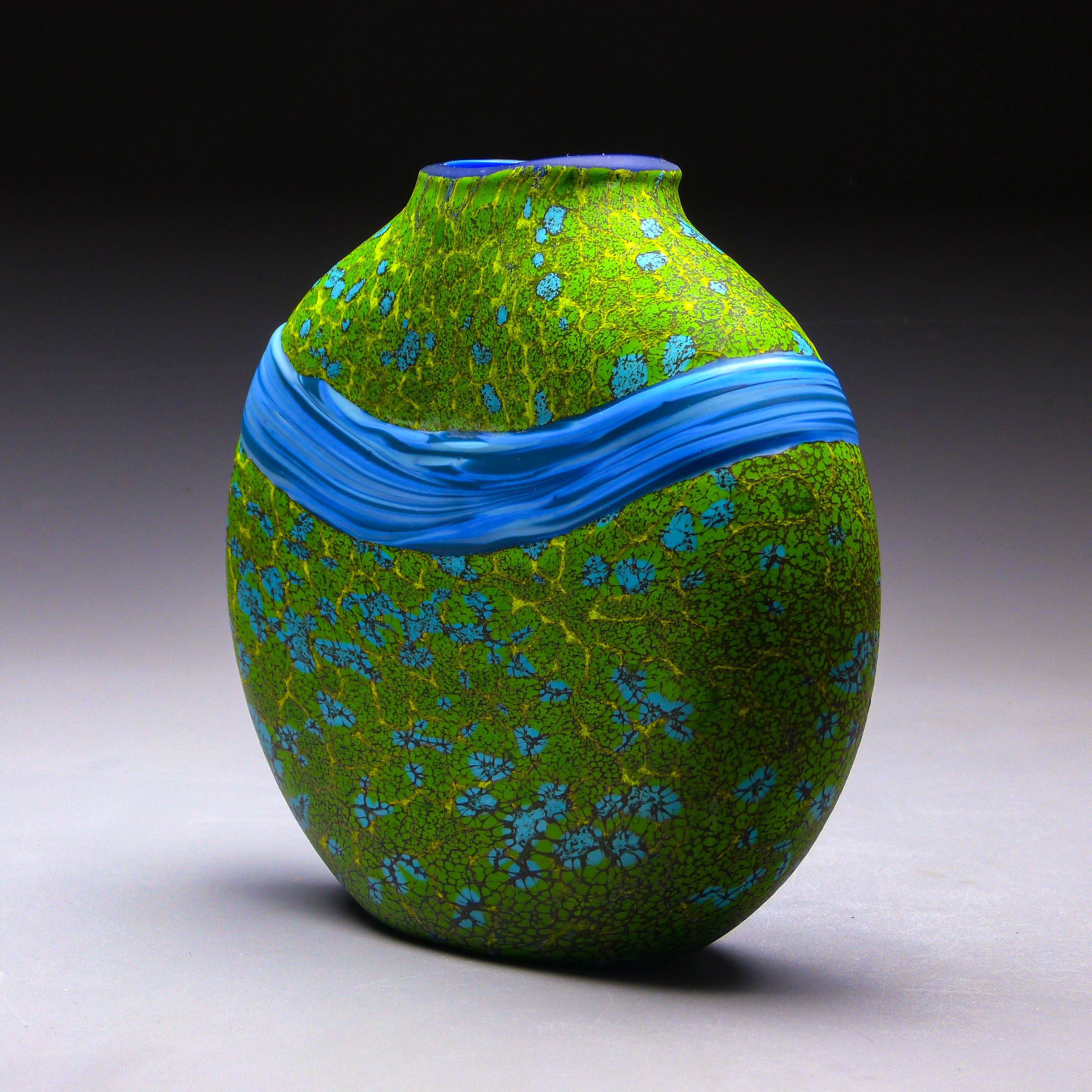 back view of green convergence vase