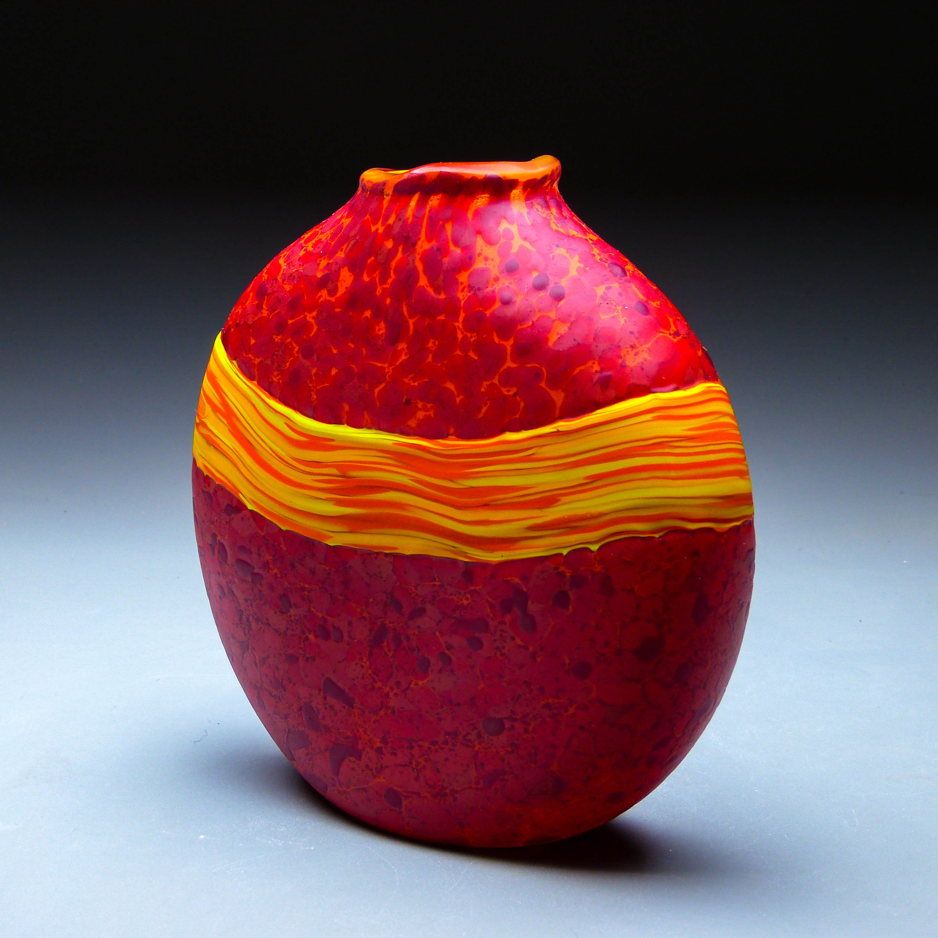 back view of red convergence vase