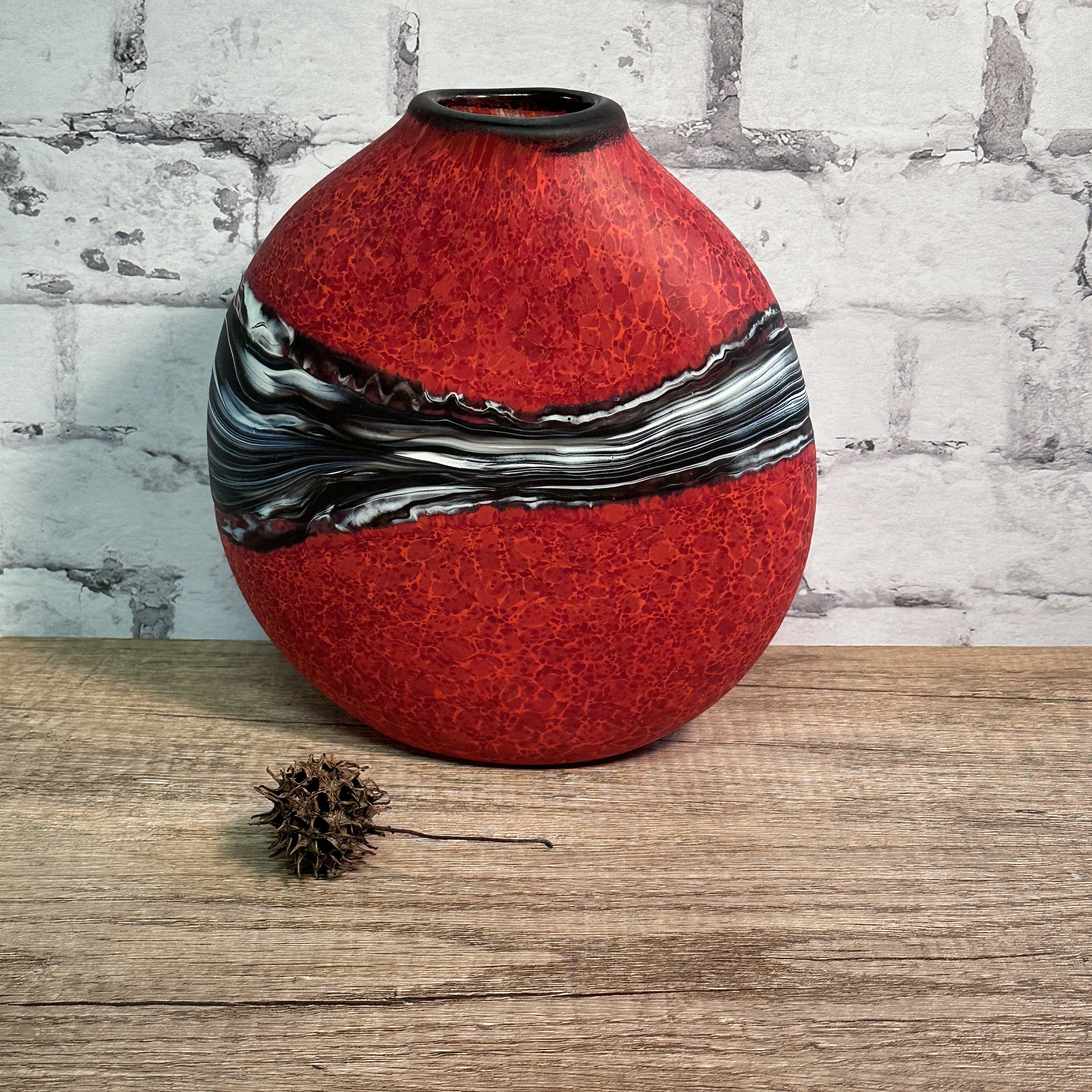 Strata vase on a shelf