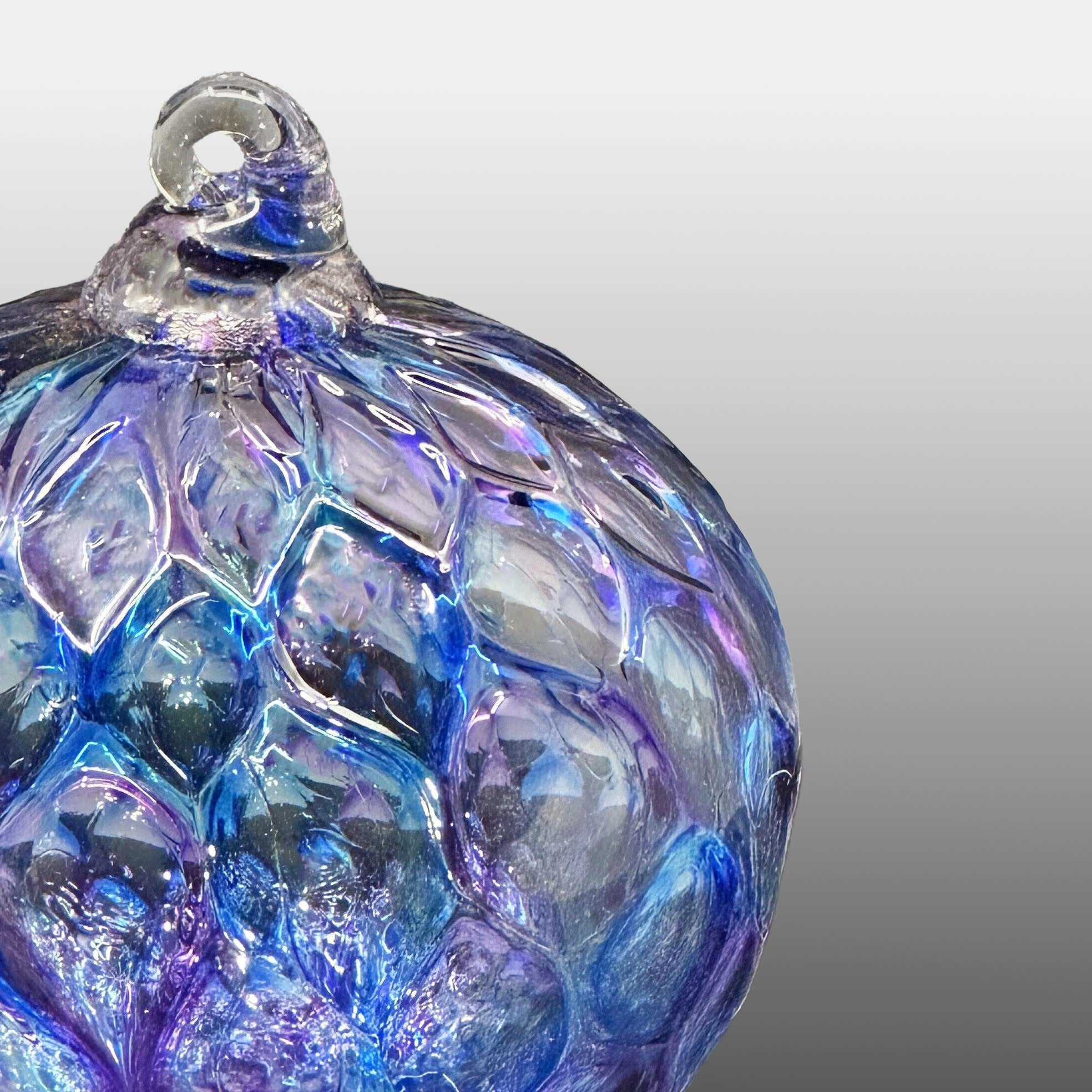 detail of purple and blue diamond carved hand-blown glass ornament