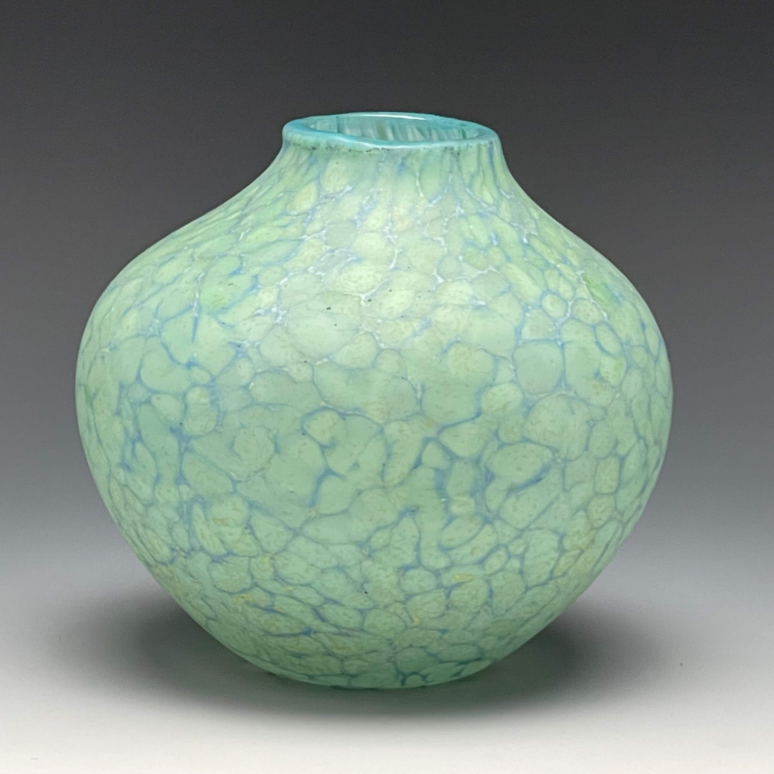 celadon sandblasted blown glass vase.