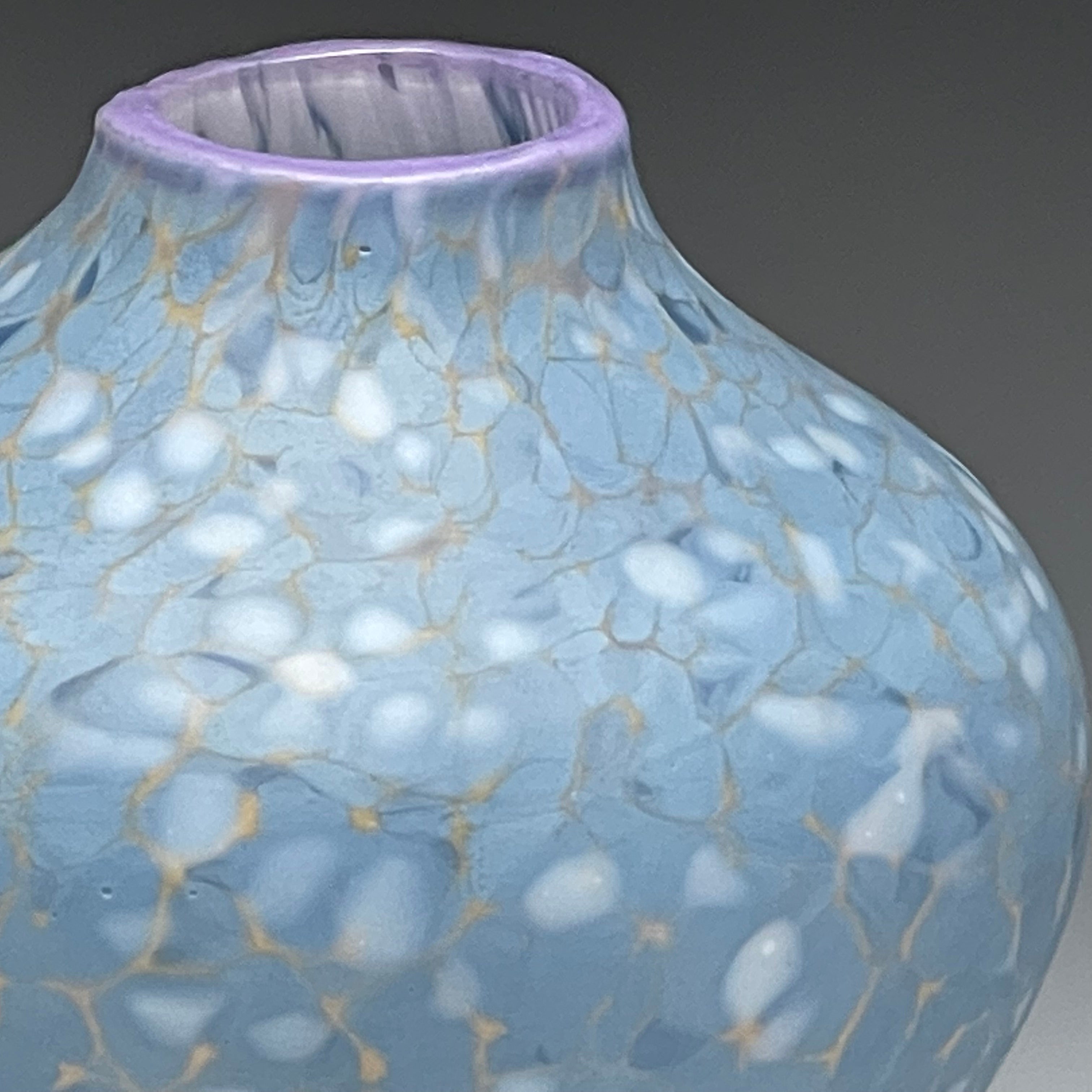 detail of periwinkle native vessel, hand-made blown glass vase.glass vase