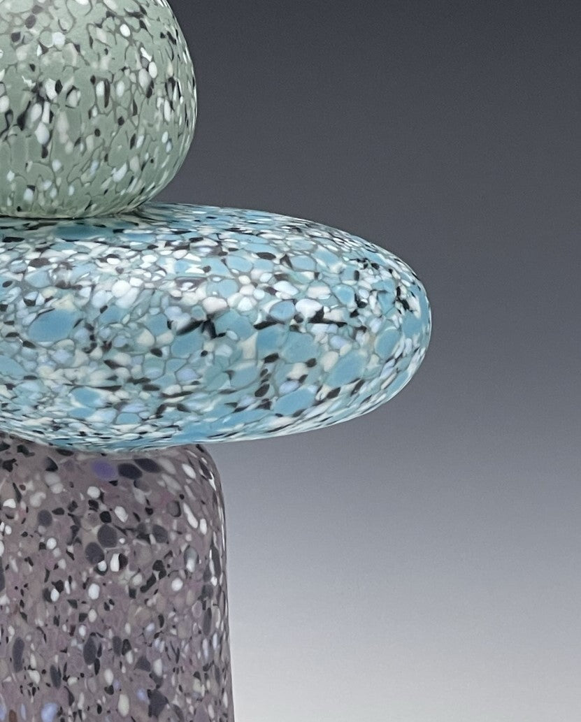 detail of 3 stone glass cairn