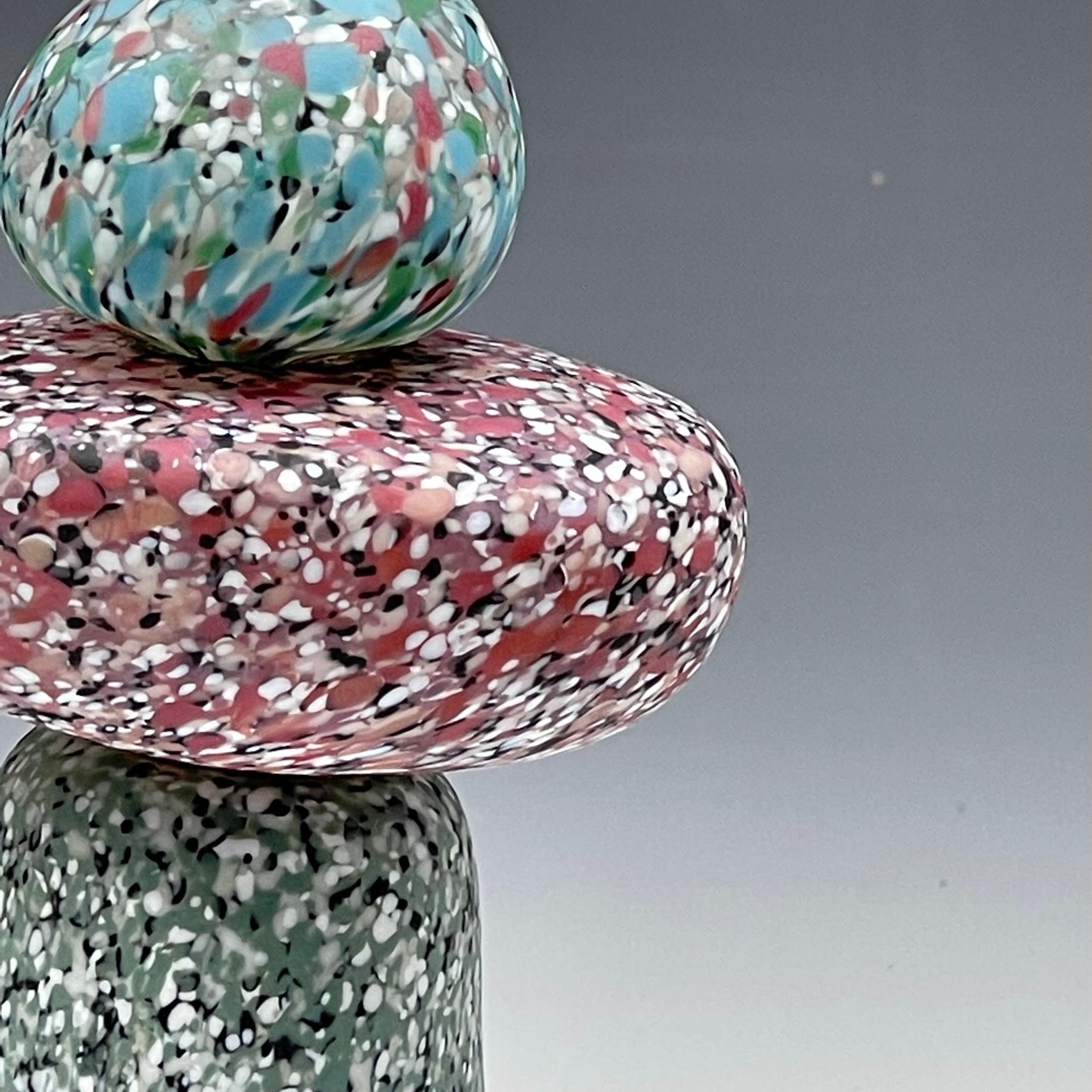 detail of 3 stone glass cairn