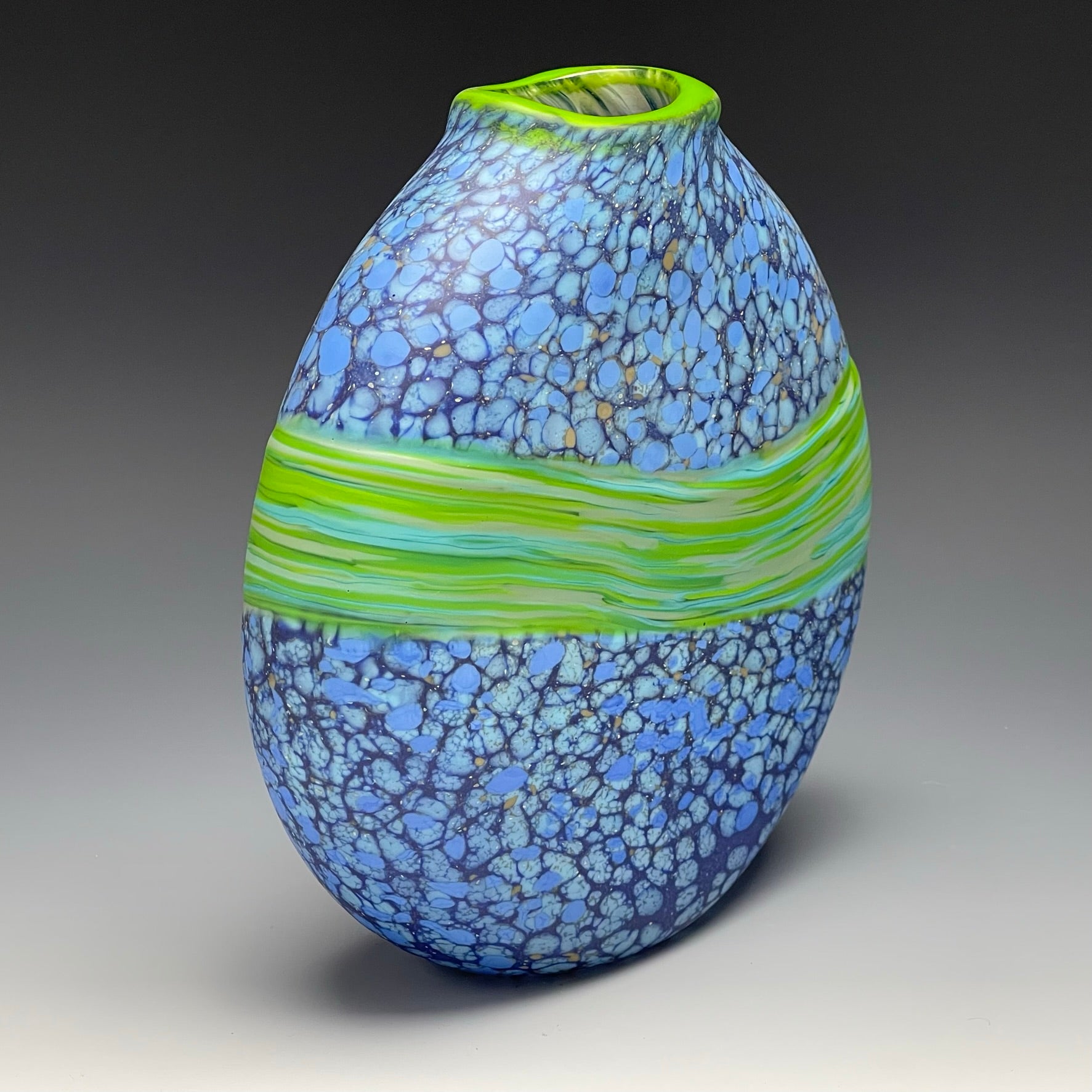 side view of blue strata vase