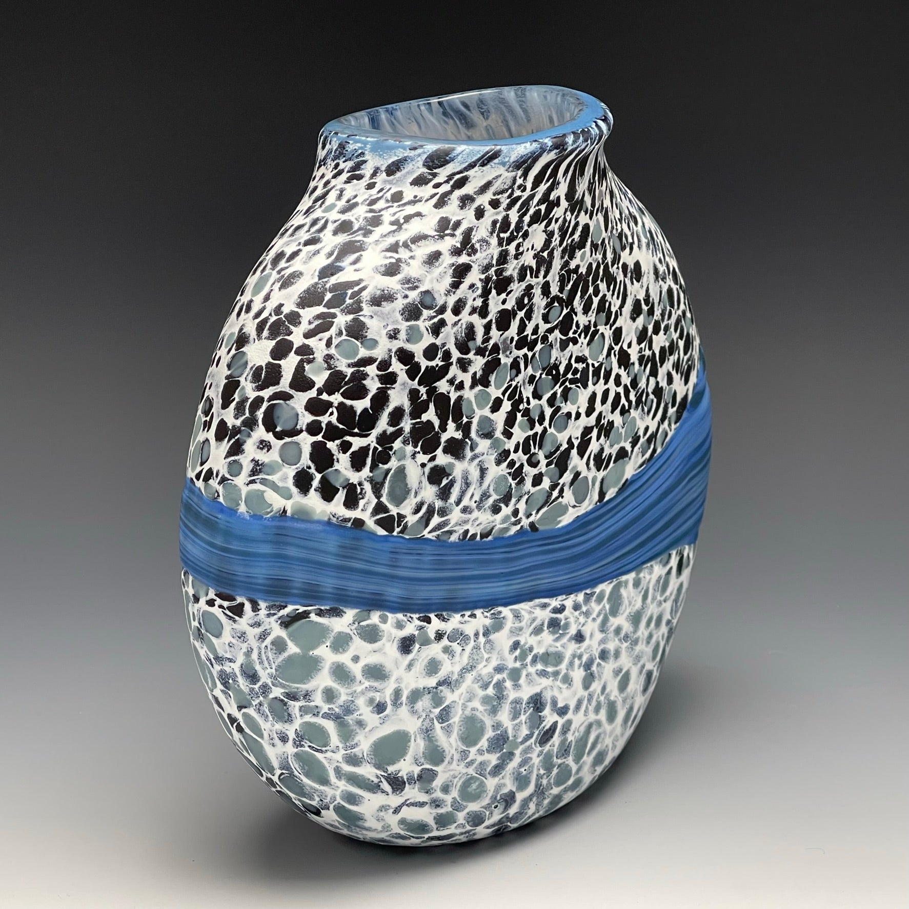 side view of white strata vase