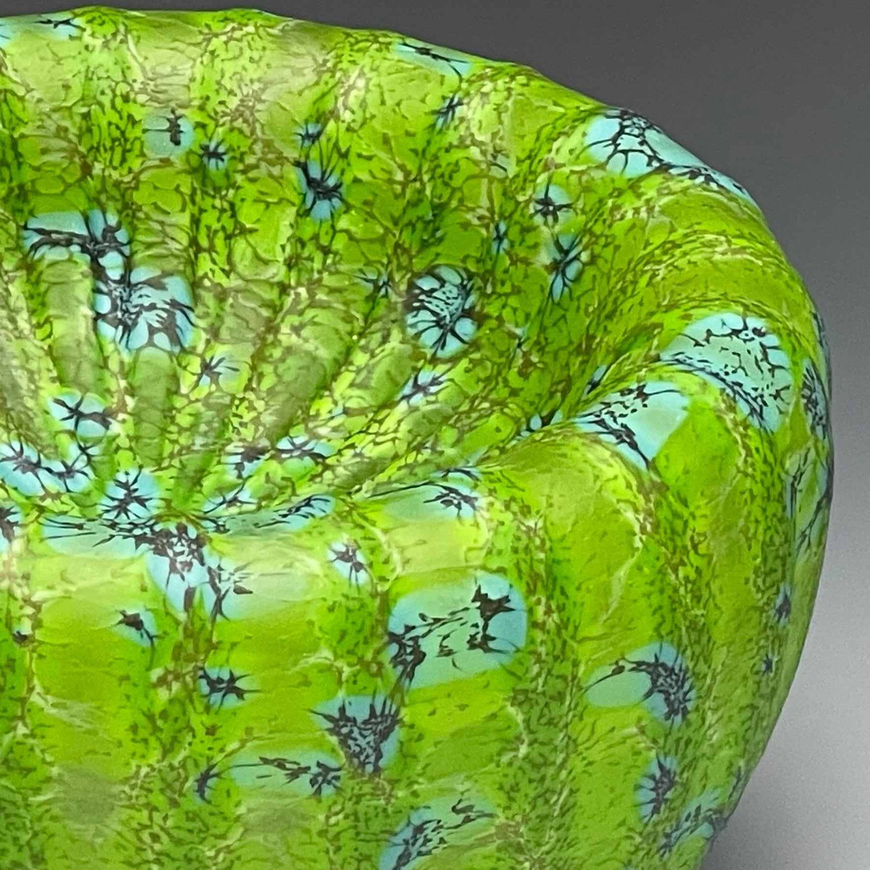 detail of green treasure bowl