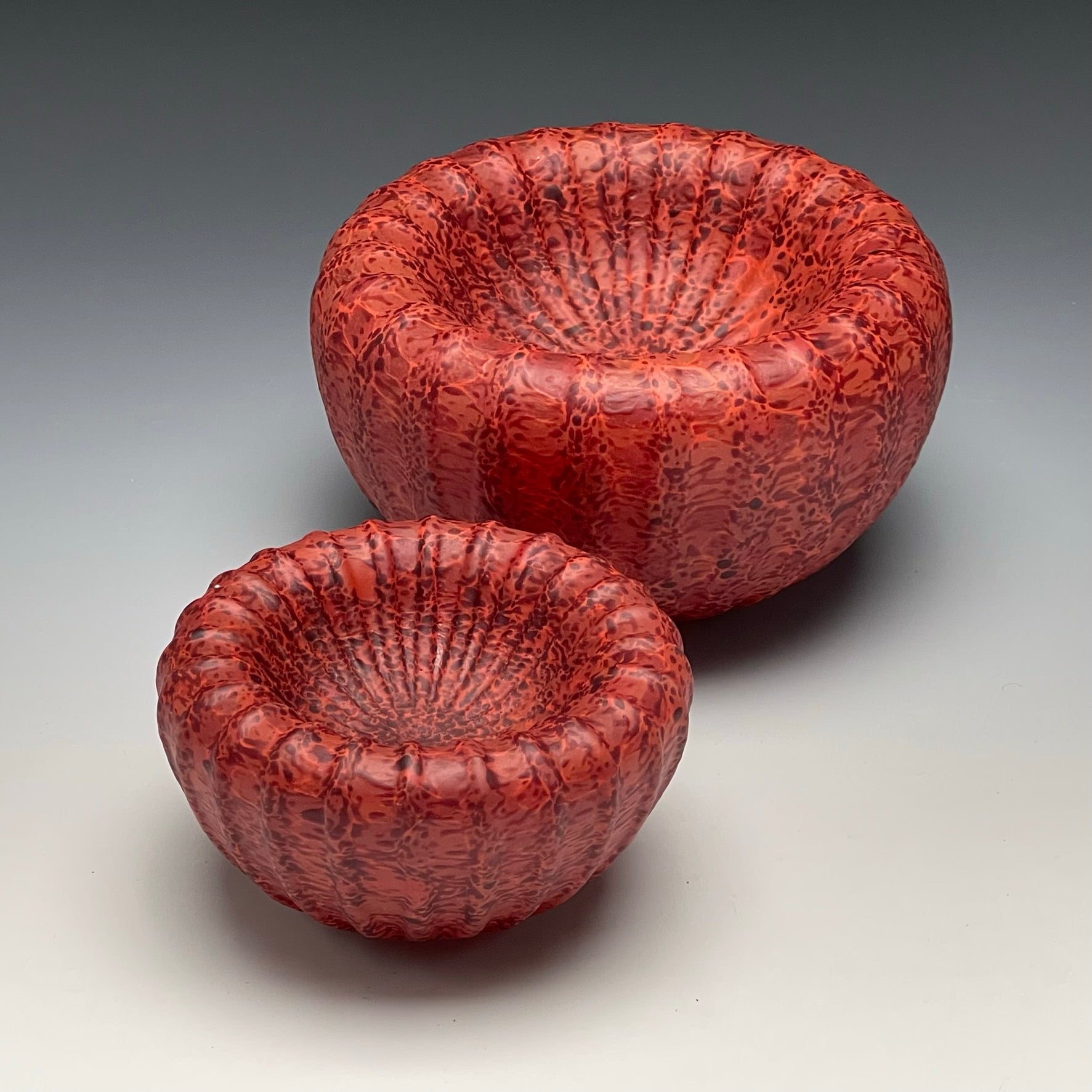 group of 2 red treasure bowls